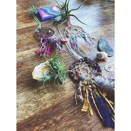 Hand crafted miniature dream catchers using real ethical feathers from Running Bug Farm.