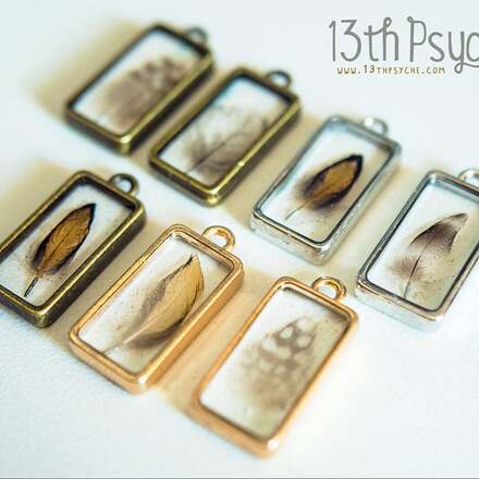 Customer appreciation photo of pendants made using feathers from Running Bug Farm.  
