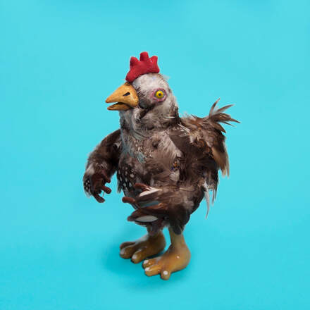Customer Image of a stop motion animated chicken made by Caitlin D. of Queens New York The feathers used to make the chicken are from Running Bug Farm in West Virginia