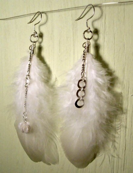 Customer photo of white feather dangle earrings using feathers purchased from Running Bug Farm.  Eco-Friendly, Humane, Non GMO.