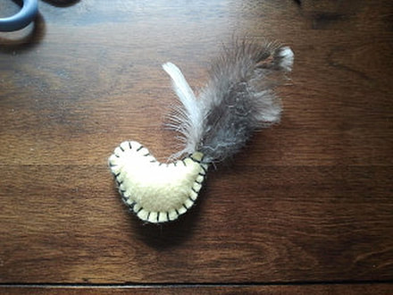 These feathers are just what I needed for my little projects!  Photo review of feathers purchased from Running Bug Farm.