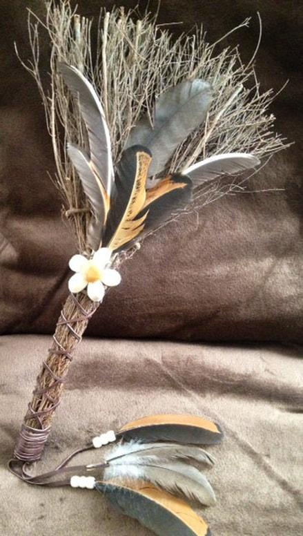 Wing feather broom with feathers from Running Bug Farm.